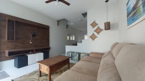 imagem 2 - Charmoso sobrado Massaguaçu para locação ou venda com 2 suítes, mobiliado à 80 metros da orla. Excelente localização. imagem 2 - Charmoso sobrado Massaguaçu para locação ou venda com 2 suítes, mobiliado à 80 metros da orla. Excelente localização.