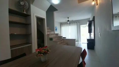 imagem 4 - Charmoso sobrado Massaguaçu para locação ou venda com 2 suítes, mobiliado à 80 metros da orla. Excelente localização. imagem 4 - Charmoso sobrado Massaguaçu para locação ou venda com 2 suítes, mobiliado à 80 metros da orla. Excelente localização.