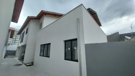 imagem 2 - Sobrado novo à venda em bairro seguro, tranquilo e residencial em Caraguatatuba, 3 suítes imagem 2 - Sobrado novo à venda em bairro seguro, tranquilo e residencial em Caraguatatuba, 3 suítes